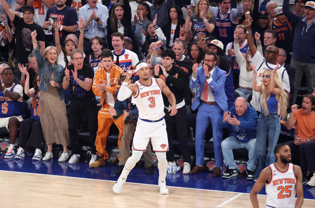 New York Knicks guard Josh Hart, number 3, reacts after scoring a three-point shot in Game 3 of the NBA Finals.