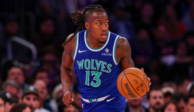 Oct 12, 2026; New York, New York, USA;  Minnesota Timberwolves point guard Ayo Dosunmu (13) dribbles up court during the first half against the New York Knicks at Madison Square Garden.  Mandatory Credit: Vincent Carchietta-Imagn Images