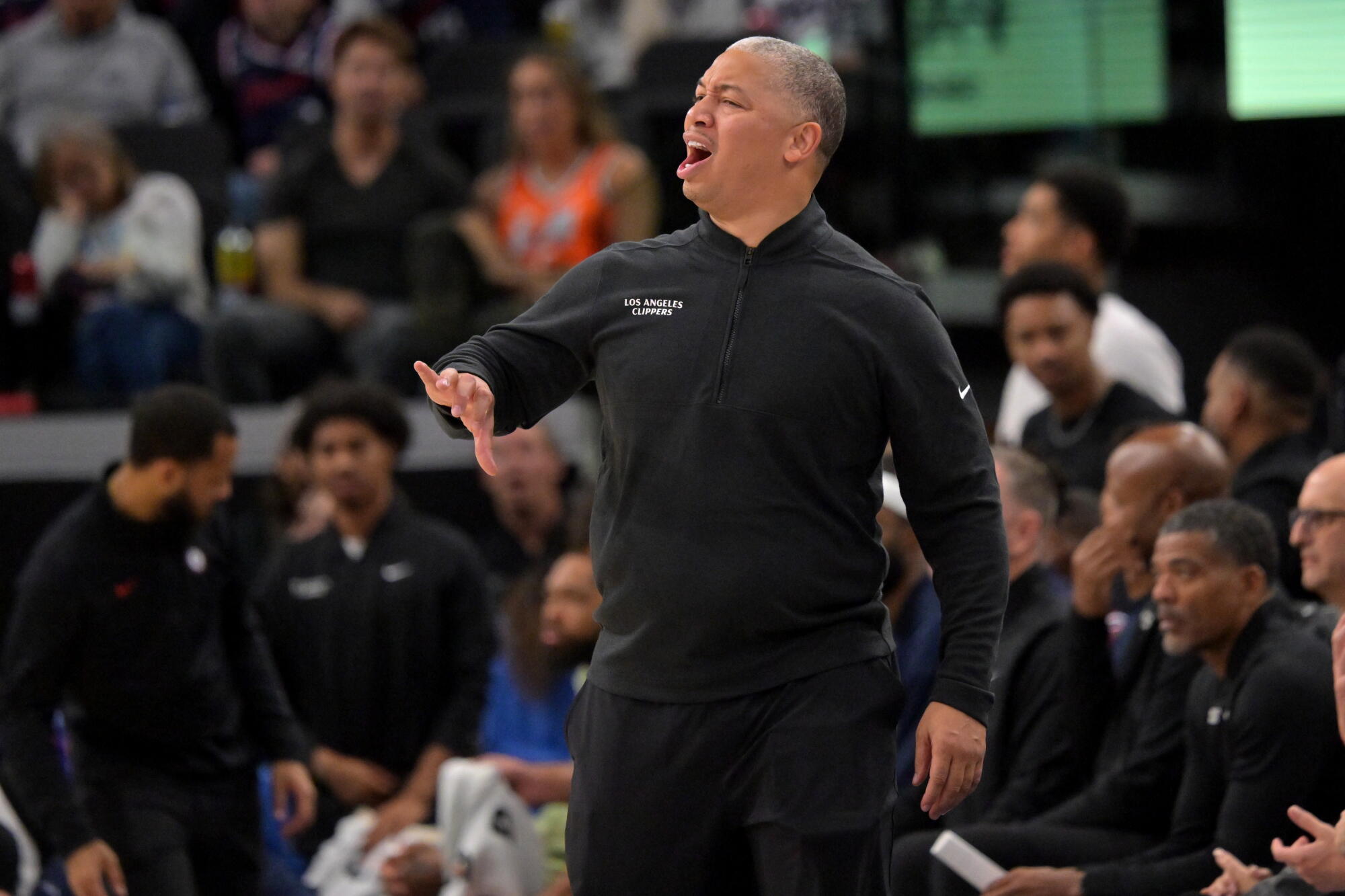 Clippers coach  Tyronn Lue directs his players during a win over the Sacramento Kings Wednesday at Intuit Dome.