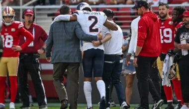 Denver Broncos cornerback Pat Surtain II (2) is helped off the field during the first half of an NFL football game against the San Francisco 49ers an NFL football game in Santa Clara, Calif., Sunday, Oct. 4, 2026. (Justine Willard, The Associated Press)