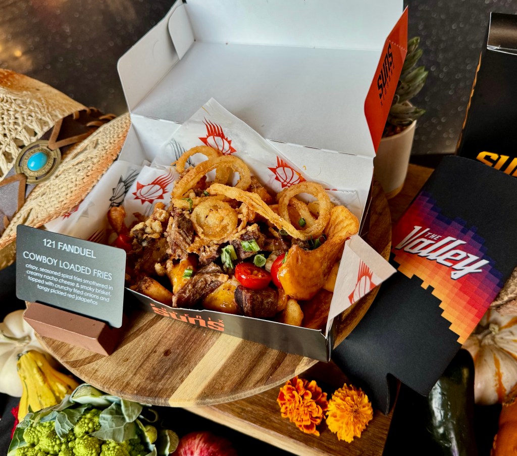 Sidewinder fries, loaded with nacho cheese and brisket, are only available at the FanDuel Lounge.