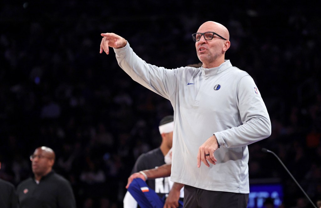 Dallas Mavericks head coach Jason Kidd points and reacts on the baseline during a game against the New York Knicks.
