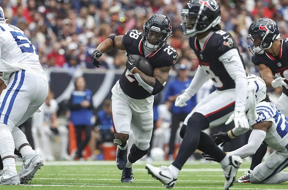 Oct 27, 2024; Houston, Texas, USA; Houston Texans running back Joe Mixon (28) runs with the ball during the game against the Indianapolis Colts at NRG Stadium. Mandatory Credit: Troy Taormina-Imagn Images