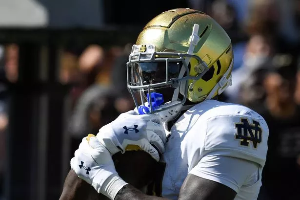 WEST LAFAYETTE, IN - SEPTEMBER 14: Notre Dame Fighting Irish Running Back Jeremiyah Love (4) secures the ball as he rushes for a touchdown during the college football game between the Notre Dame Fighting Irish and the Purdue Boilermakers on September 14, 2024, at Ross-Ade Stadium in West Lafayette, Indiana. (Photo by Michael Allio/Icon Sportswire via Getty Images)