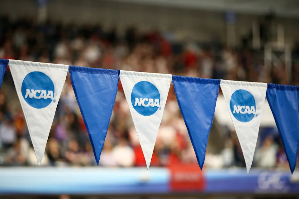 GREENSBORO, NORTH CAROLINA - MARCH 21: The NCAA logo is shown on a pennant during the Division III Men's and Women's Swimming and Diving Championship held at the Greensboro Aquatic Center on March 21, 2025 in Greensboro, North Carolina. (Photo by Isaiah Vazquez/NCAA Photos via Getty Images)