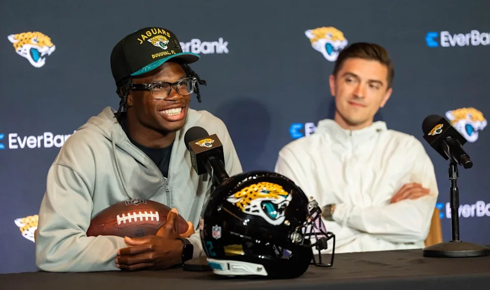 The Jacksonville Jaguars’ first-round pick, Colorado Buffaloes wide receiver and defensive back Travis Hunter, left, answers questions as General Manager James Gladstone, right, sits next to him during a press conference Friday, March 25, 2025 at Miller Electric Center in Jacksonville, Fla. [Doug Engle/Florida Times-Union]Doug Engle&sol;Florida Times-Union