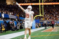 Texas Longhorns tight end Gunnar Helm (85) celebrates his double overtime touchdown catch...