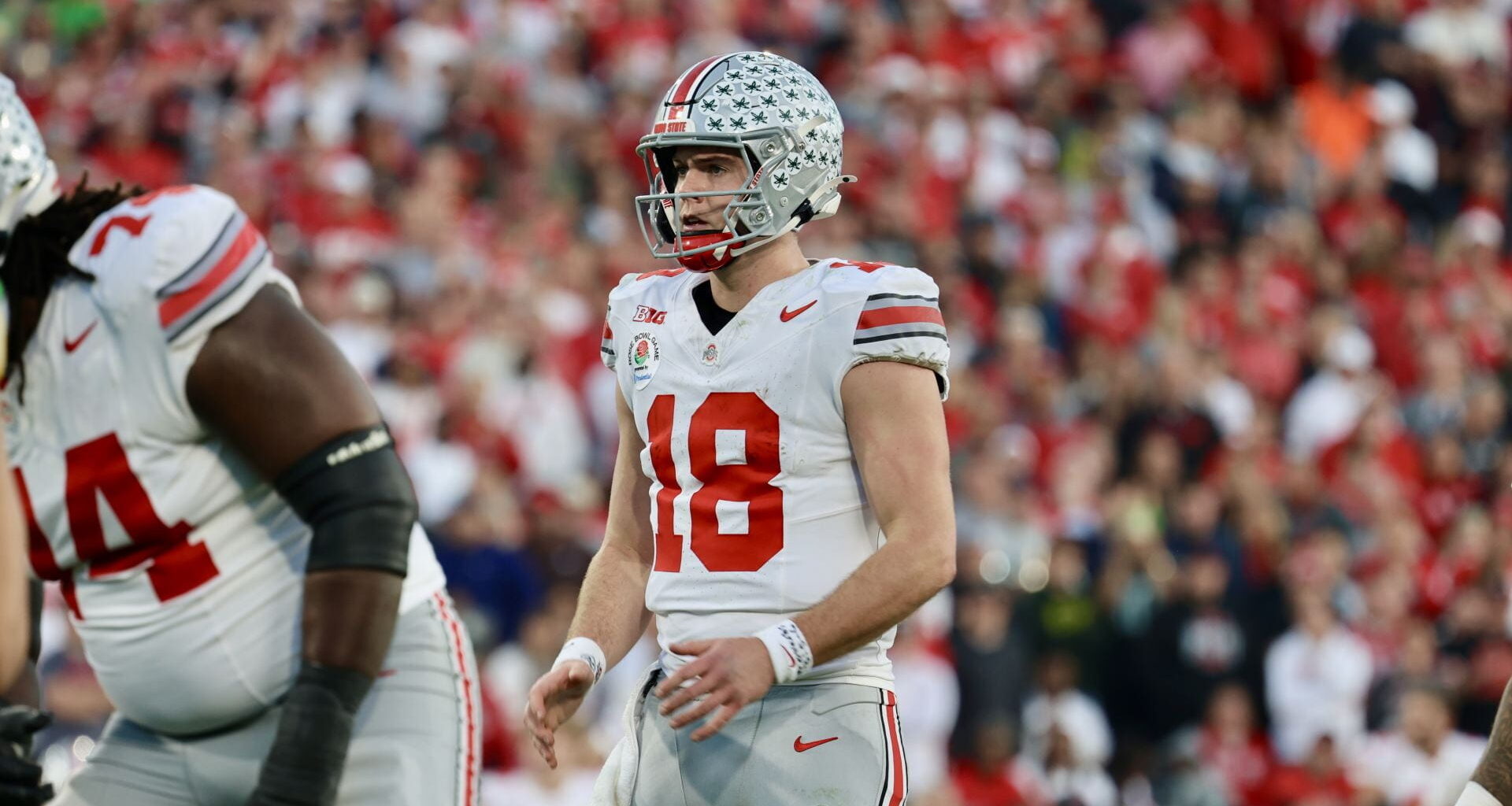 Graduate quarterback Will Howard (18) prepares for a snap during the No. 8 Buckeyes game against no. 1 Oregon at the Rose Bowl Wednesday in Pasadena, CA. The Buckeyes came out victorious with a 41-21 win over the Ducks. Credit: Carly Damon