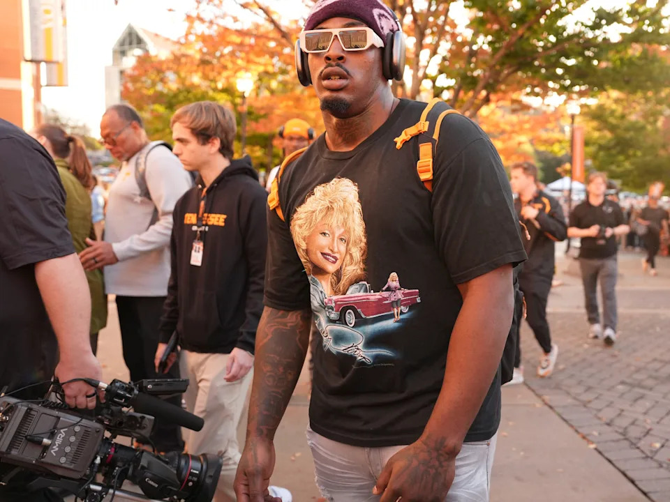 Tennessee defensive lineman Omarr Norman-Lott (55) wearing a Dolly Parton shirt during the Vol Walk for the NCAA college football game against Kentucky on Saturday, Nov. 2, 2024, in Knoxville, Tenn.