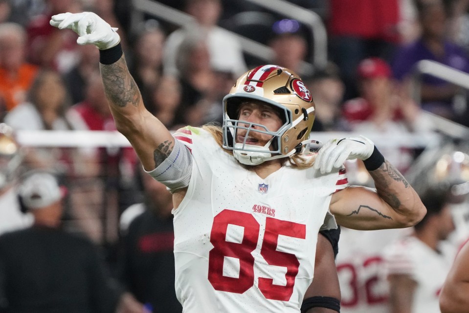 George Kittle, #85, of the San Francisco 49ers, celebrating a catch.