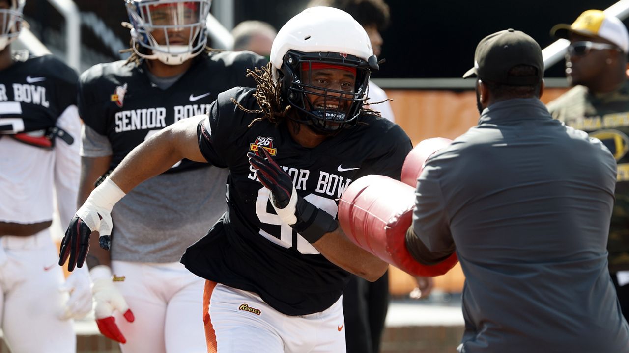 American team defensive lineman T.J. Sanders of South Carolina (90) runs through drills during practice for the Senior Bowl NCAA college football game, Wednesday, Jan. 29, 2025, in Mobile, Ala. (AP Photo/Butch Dill)