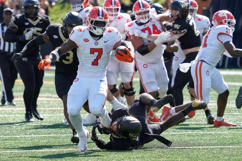 Clemson running back Phil Mafah (7) runs against Wake Forest during the first half of an...