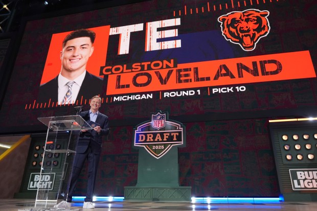 NFL Commissioner Roger Goodell announces Colston Loveland being chosen by...