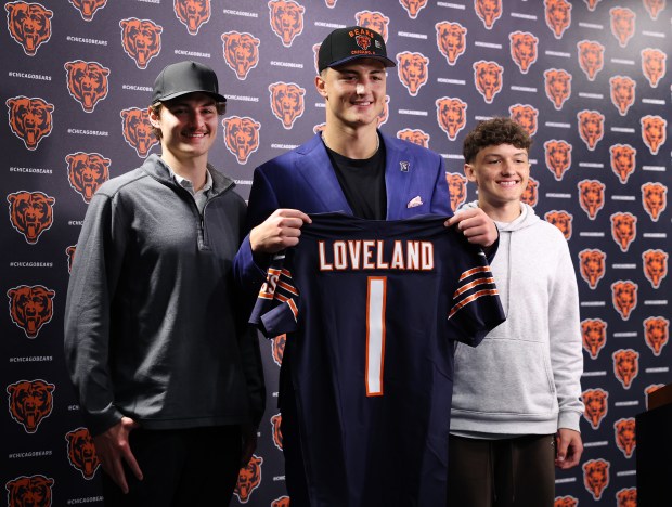 Bears tight end Colston Loveland poses for a photograph with...