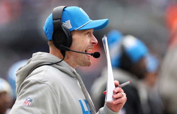 Detroit Lions offensive coordinator Ben Johnson works on the Lions sideline in the second quarter of a game against the Chicago Bears at Soldier Field in Chicago on Dec. 22, 2024. (Chris Sweda/Chicago Tribune)