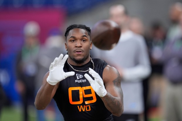 Missouri wide receiver Luther Burden III runs a drill at the scouting combine on March 1, 2025, in Indianapolis. (George Walker IV/AP)