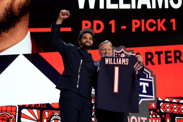 Caleb Williams poses with NFL Commissioner Roger Goodell after the Bears selected him with the No. 1 pick in the draft on April 25, 2024, in Detroit. (Gregory Shamus/Getty Images)