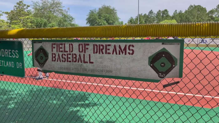 Creekside High School football players volunteer at Field of Dreams baseball league in St. Johns County