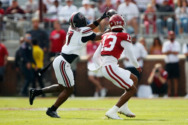 Free safety Nick Emmanwori (7) of the South Carolina Gamecocks intercepts a pass intended for wide receiver J.J. Hester (13) of the Oklahoma Sooners on the first play of the game at Gaylord Family Oklahoma Memorial Stadium on Oct. 19, 2024 in Norman, Okla. South Carolina won 35-9. (Brian Bahr, Getty Images)