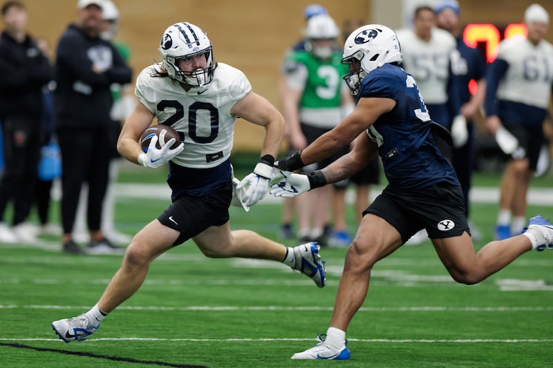 BYU tight end Carsen Ryan runs after a catch during spring practice on March 15 at the indoor practice facility. Ryan transfer from Utah to BYU in the offseason.