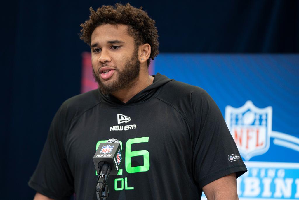 Marcus Mbow talks with the media during the NFL Combine.