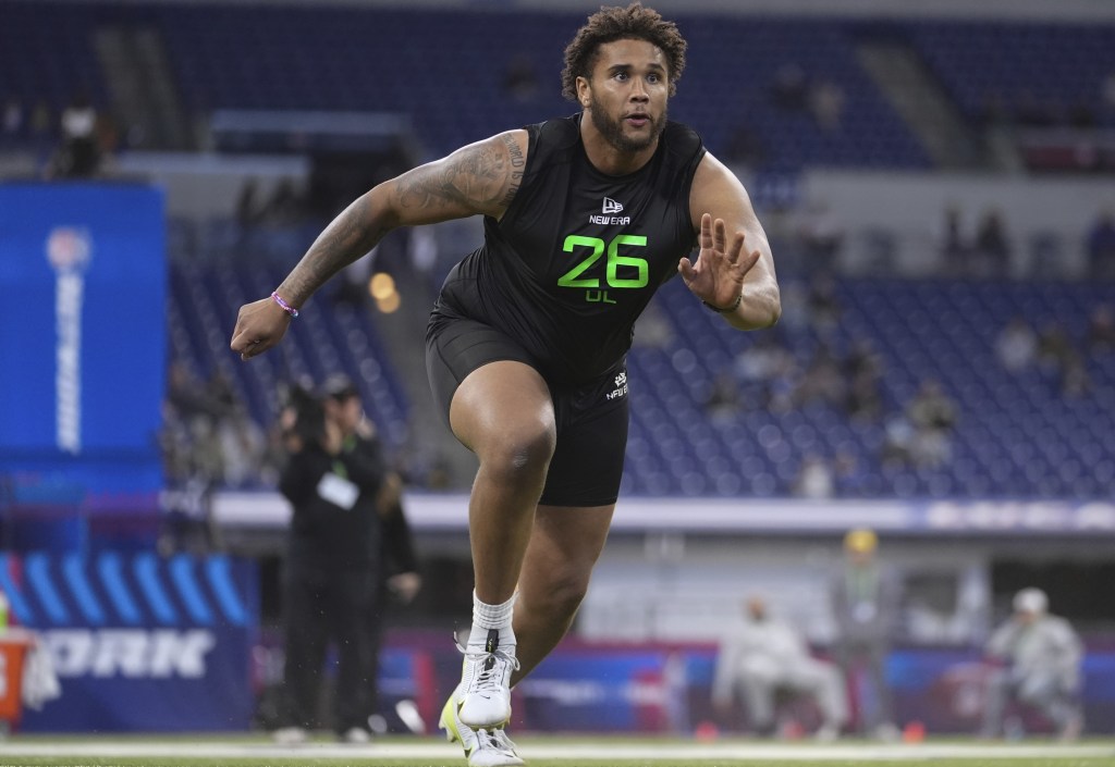 Marcus Mbow, doing a running drill at the NFL Combine, was drafted in the fifth round by the Giants.
