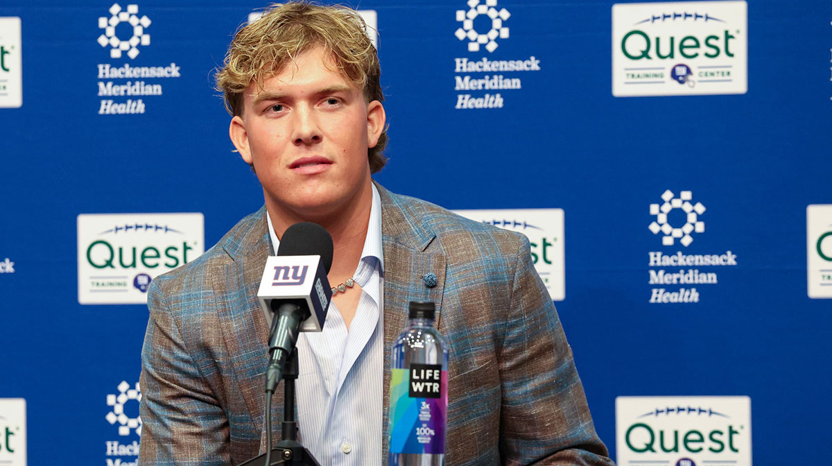 New York Giants first round draft picks, Abdul Carter and Jaxson Dart pose for photos prior to the start of the press conference.