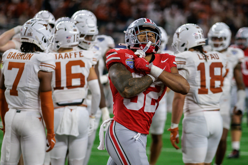 ARLINGTON, TX - JANUARY 10: Running Back TreVeyon Henderson #32 of the Ohio State Buckeyes reacts after scoring a touchdown during the Ohio State Buckeyes versus Texas Longhorns College Football Playoff Semifinal at the Cotton Bowl Classic on January 10, 2025, at AT&T Stadium in Arlington, TX. (Photo by William Purnell/Icon Sportswire)