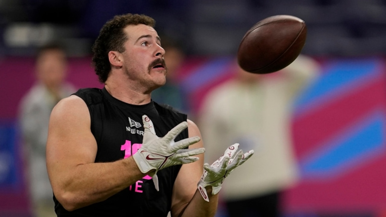Robbie Ouzts (with his moustache) heads for a new position with Seattle Seahawks