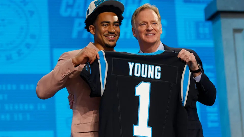<div>KANSAS CITY, MISSOURI - APRIL 27: (L-R) Bryce Young poses with NFL Commissioner Roger Goodell after being selected first overall by the Carolina Panthers during the first round of the 2023 NFL Draft at Union Station on April 27, 2023 in Kansas City, Missouri. (Photo by David Eulitt/Getty Images)</div>