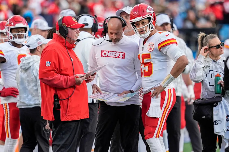 Kansas City Chiefs coach Andy Reid talks with quarterback Patrick Mahomes. Jim Dedmon-Imagn Images
