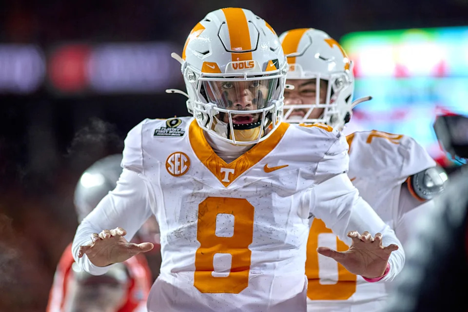 COLUMBUS, OHIO - DECEMBER 21: Quarterback Nico Iamaleava #8 of the Tennessee Volunteers celebrates with teammates after scoring a touchdown in action during the College Football Playoff First Round game between the Tennessee Volunteers and the Ohio State Buckeyes at Ohio Stadium on December 21, 2024 in Columbus, Ohio. (Photo by Robin Alam/ISI Photos/Getty Images)