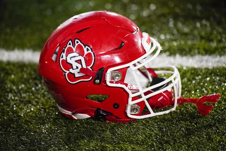 Aug 31, 2023; Columbia, Missouri, USA; A general view of a South Dakota Coyotes helmet against the Missouri Tigers during the second half at Faurot Field at Memorial Stadium. Mandatory Credit: Denny Medley-USA TODAY Sports
