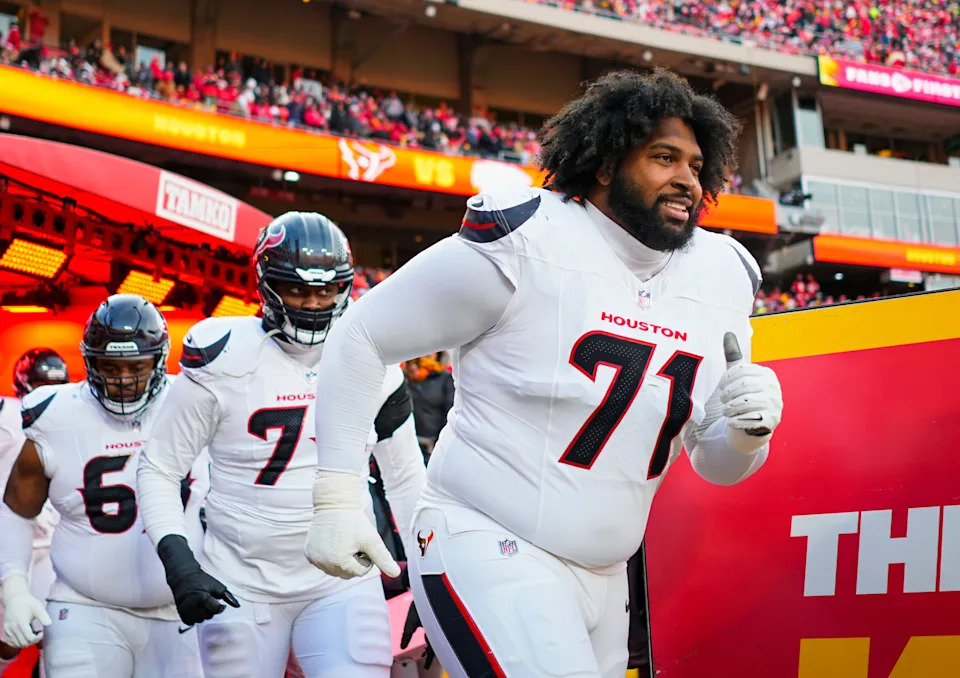Jan 18, 2025; Kansas City, Missouri, USA; Houston Texans offensive tackle Tytus Howard (71) takes the field prior to a 2025 AFC divisional round game against the Kansas City Chiefs at GEHA Field at Arrowhead Stadium. Mandatory Credit: Jay Biggerstaff-Imagn Images