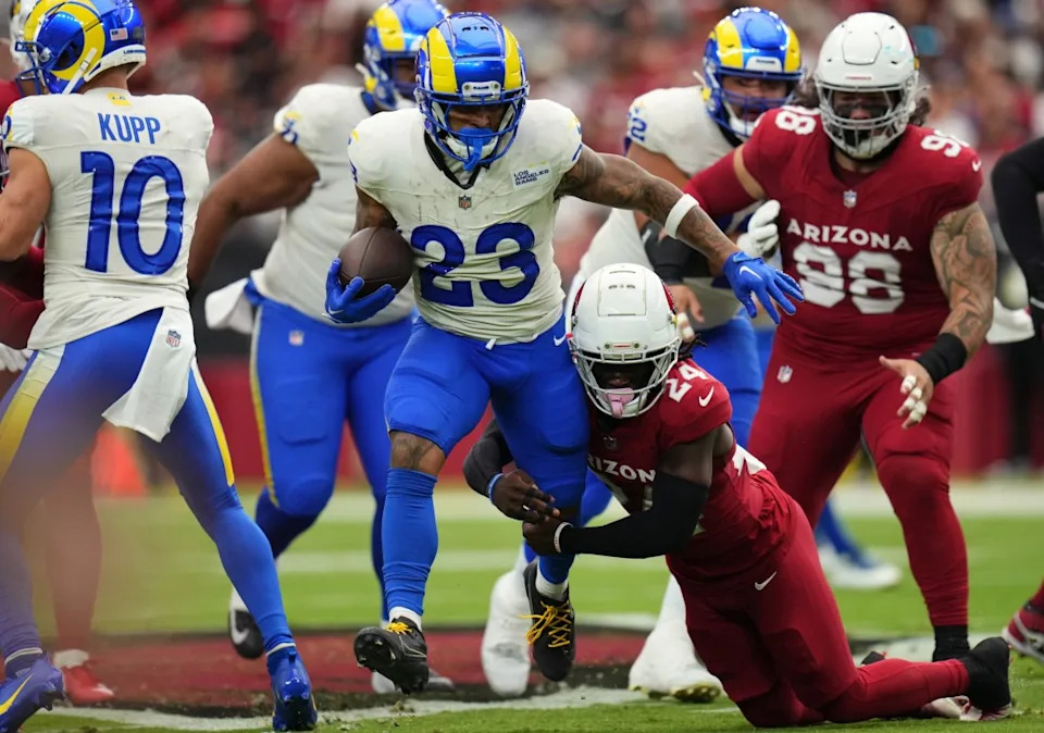 Arizona Cardinals cornerback Starling Thomas V (24) tackles Los Angeles Rams running back Kyren Williams (23) at State Farm Stadium on Sept. 15, 2024. Joe Rondone/The Republic / USA TODAY NETWORK via Imagn ImagesJoe Rondone/The Republic / USA TODAY NETWORK via Imagn Images