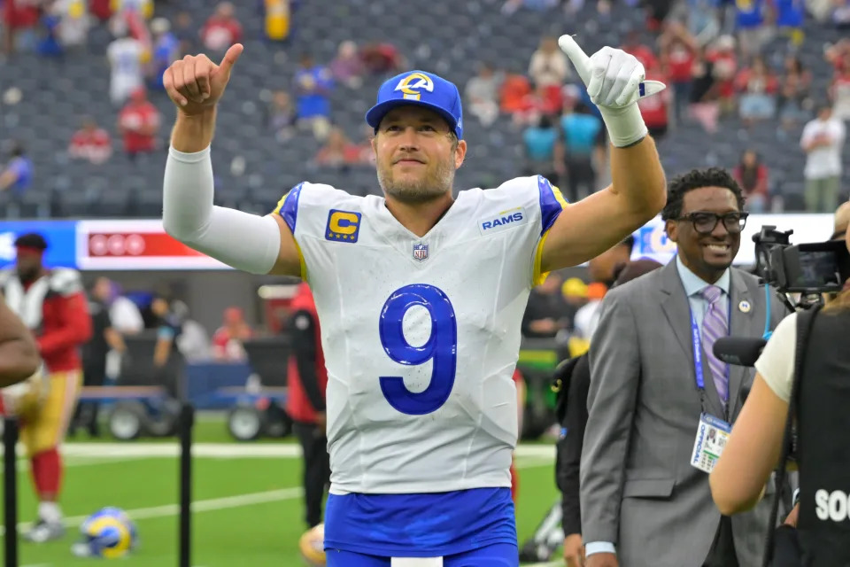 Sep 22, 2024; Inglewood, California, USA; Los Angeles Rams quarterback Matthew Stafford (9) celebrates as he leaves the field after defeating the San Francisco 49ers at SoFi Stadium. Mandatory Credit: Jayne Kamin-Oncea-Imagn Images