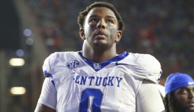 Kentucky defensive tackle Deone Walker (0) walks off the field at halftime of an NCAA college football game against Florida, Saturday, Oct. 19 2024, in Gainesville, Fla. Florida defeated Kentucky 48-20. (AP Photo/Gary McCullough)