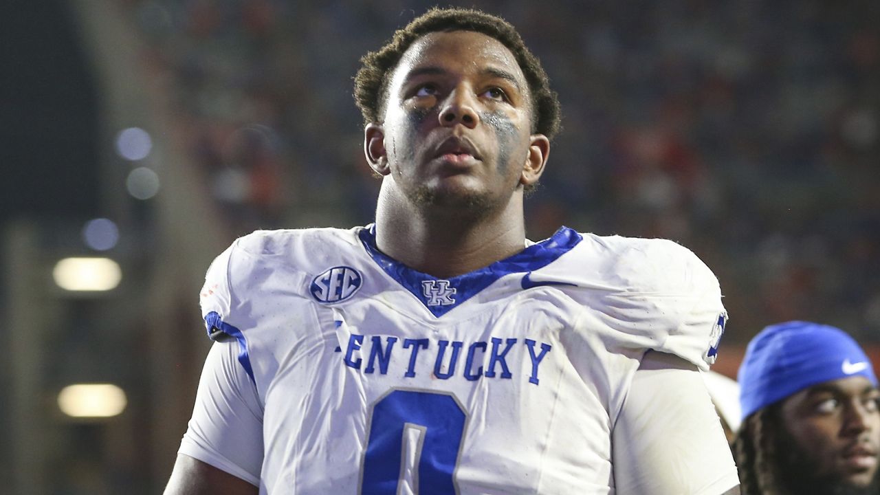 Kentucky defensive tackle Deone Walker (0) walks off the field at halftime of an NCAA college football game against Florida, Saturday, Oct. 19 2024, in Gainesville, Fla. Florida defeated Kentucky 48-20. (AP Photo/Gary McCullough)