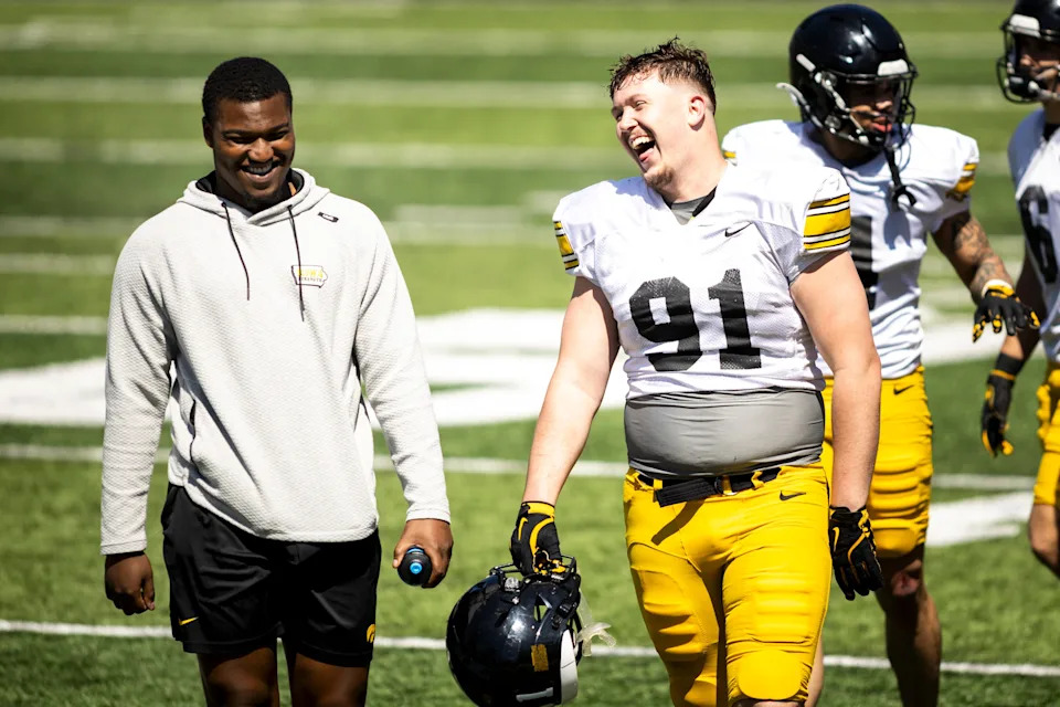 Apr 26, 2025; Iowa City, IA, USA; Iowa defensive lineman Jonah Pace (91) laughs with teammates during a spring NCAA football open practice at Kinnick Stadium. Mandatory Credit: Joseph Cress/For the Register