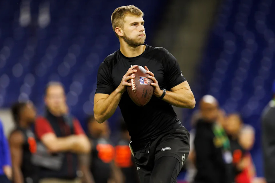 INDIANAPOLIS, INDIANA - MARCH 1: Tyler Shough #QB14 of Louisville participates in a drill during the NFL Scouting Combine at Lucas Oil Stadium on March 1, 2025 in Indianapolis, Indiana. (Photo by Brooke Sutton/Getty Images)