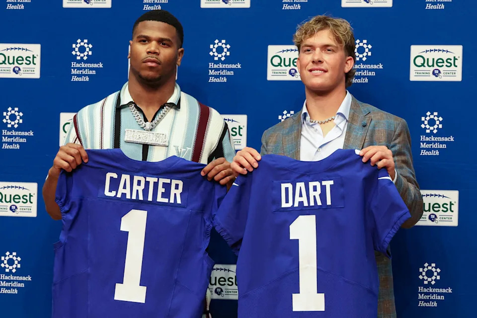 Apr 25, 2025; East Rutherford, NJ, US; New York Giants first round draft picks, Abdul Carter and Jaxson Dart pose for photos prior to the start of the press conference.  Mandatory Credit: Thomas Salus-Imagn Images
