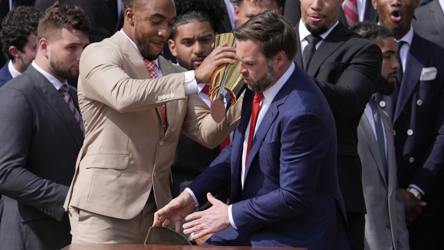 Vance fumbles Ohio State's NCAA football championship trophy