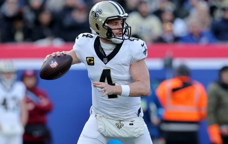 BRAD PENNER-IMAGN IMAGES/ FILE PHOTO
                                New Orleans Saints quarterback Derek Carr drops back to pass, in December 2024, against the New York Giants during the first quarter at MetLife Stadium.