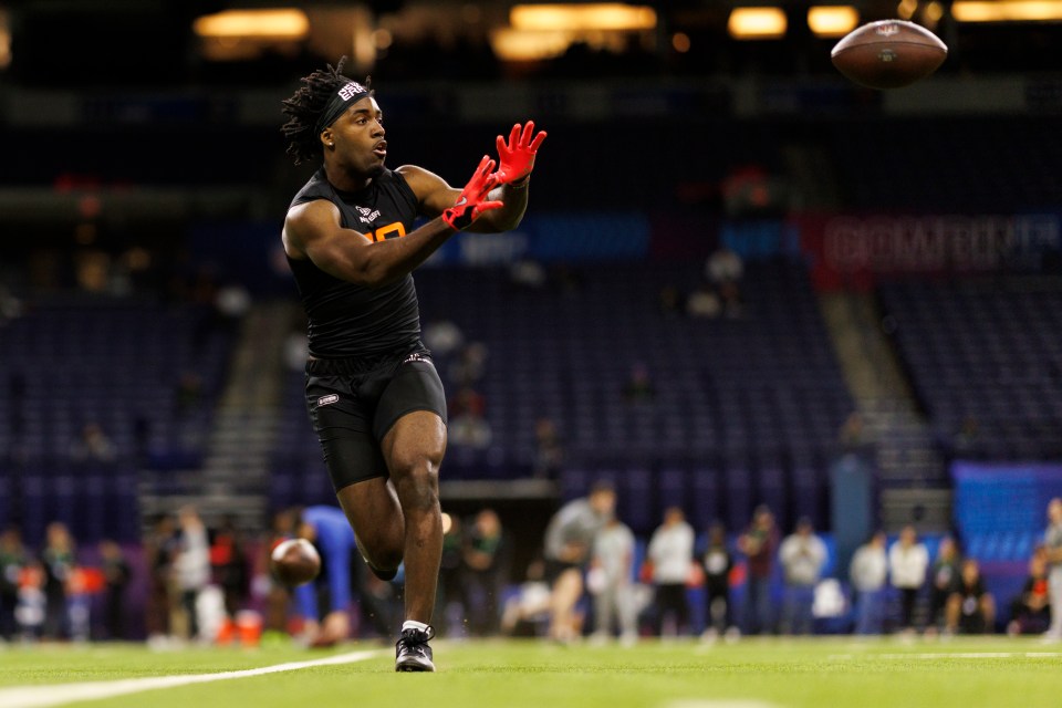 Jalen Royals of Utah State catching a football at the NFL Scouting Combine.