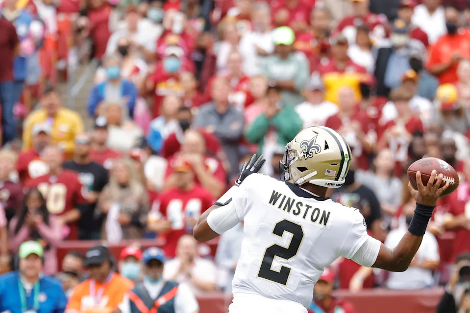 Oct 10, 2021; Landover, Maryland, USA; New Orleans Saints quarterback Jameis Winston (2) throws a touchdown pass to Saints wide receiver Deonte Harris (not pictured) against the Washington Football Team during the first quarter at FedExField. Mandatory Credit: Geoff Burke-USA TODAY Sports