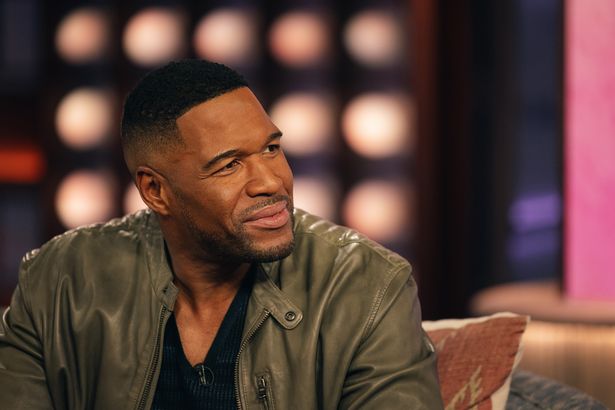 Michael Strahan was shocked upon hearing that Troy Aikman picked the Cowboys to win Super Bowl LX