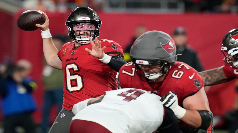 Tampa Bay Buccaneers quarterback Baker Mayfield (6) throws a pass against the Washington Commanders during an NFL wild-card playoff football game Sunday, Jan. 12, 2025, in Tampa, Fla. (AP Photo/Chris O'Meara)