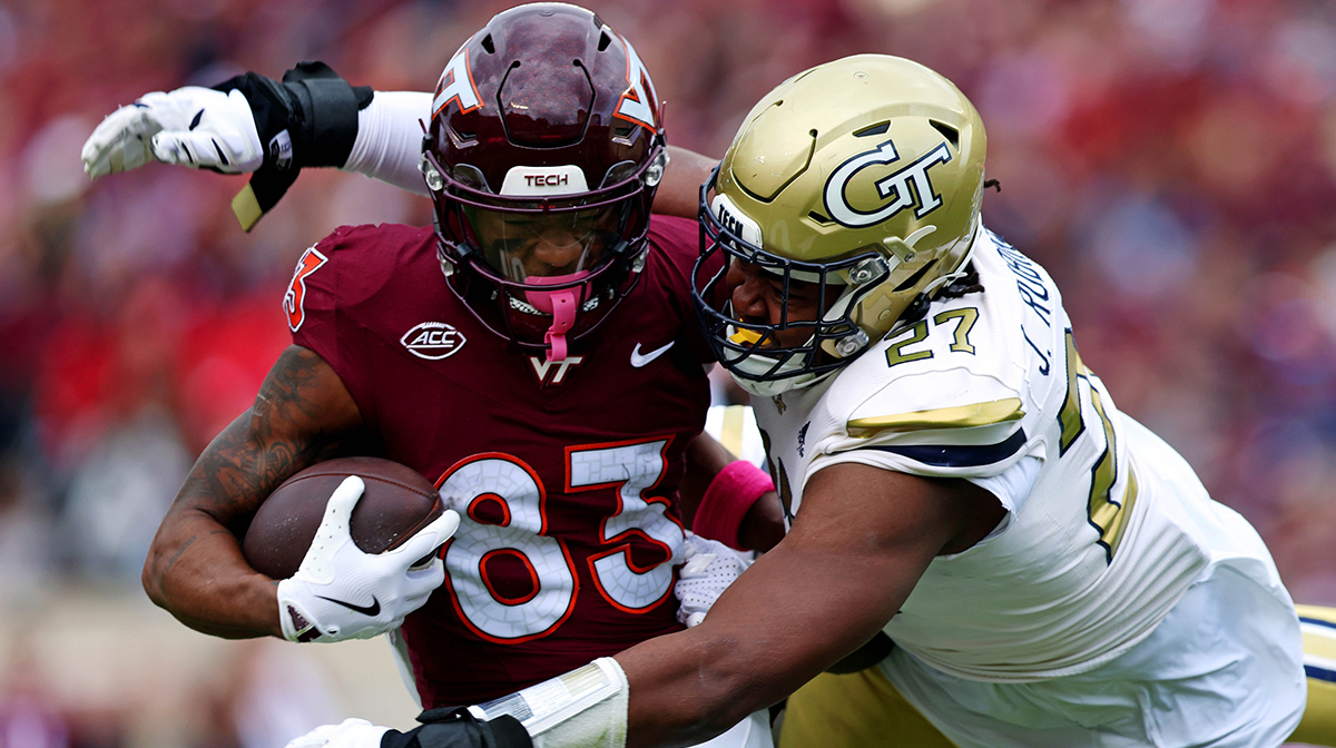 Georgia Tech Yellow Jackets defensive lineman Joshua Robinson (27) tackles Virginia Tech Hokies wide receiver Jaylin Lane (83) during the second quarter at Lane Stadium.