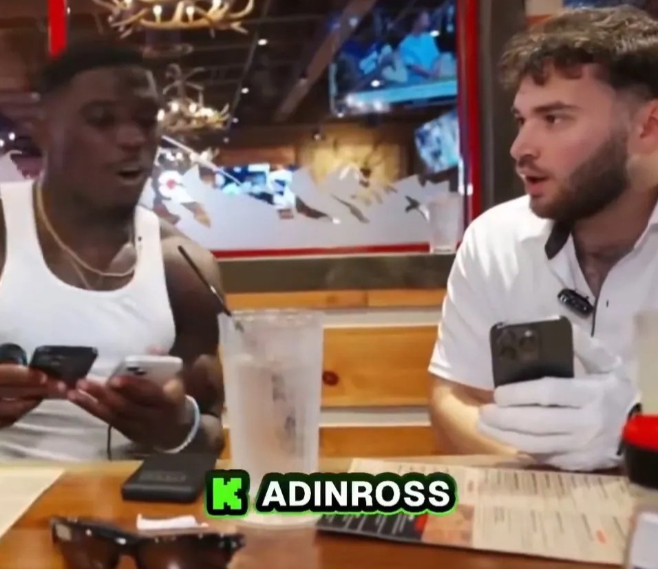 Screenshot of two men reacting to Tyreek Hill being traded from the Miami Dolphins.