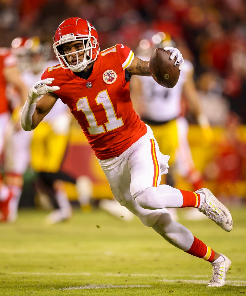 Demarcus Robinson #11 of the Kansas City Chiefs running with the football.